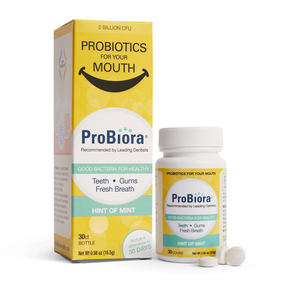 Product packaging and supplement bottle for ProBiora oral probiotics, labeled as "Good bacteria for healthy teeth, gums, and fresh breath."