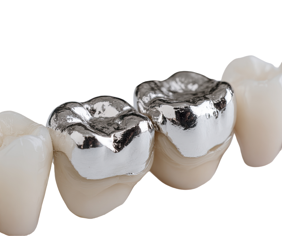 A close-up of a dentist using a rubber dam and specialized high-volume suction for the safe removal of silver amalgam fillings.