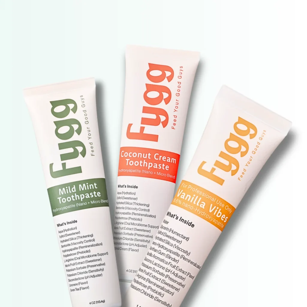 Three tubes of Fygg toothpaste in Mild Mint, Coconut Cream, and Vanilla Vibes flavors, highlighting their nano and micro hydroxyapatite blends.