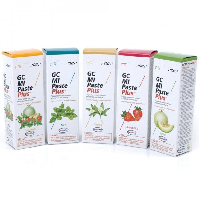Five tubes of GC MI Paste Plus in various flavors (Tutti-Frutti, Mint, Vanilla, Strawberry, and Melon), used for remineralizing tooth enamel.