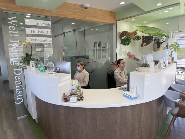 The welcoming reception and waiting area at Well Being Dentistry in Santa Clara, CA, where patients can discuss affordable holistic dentistry financing options.